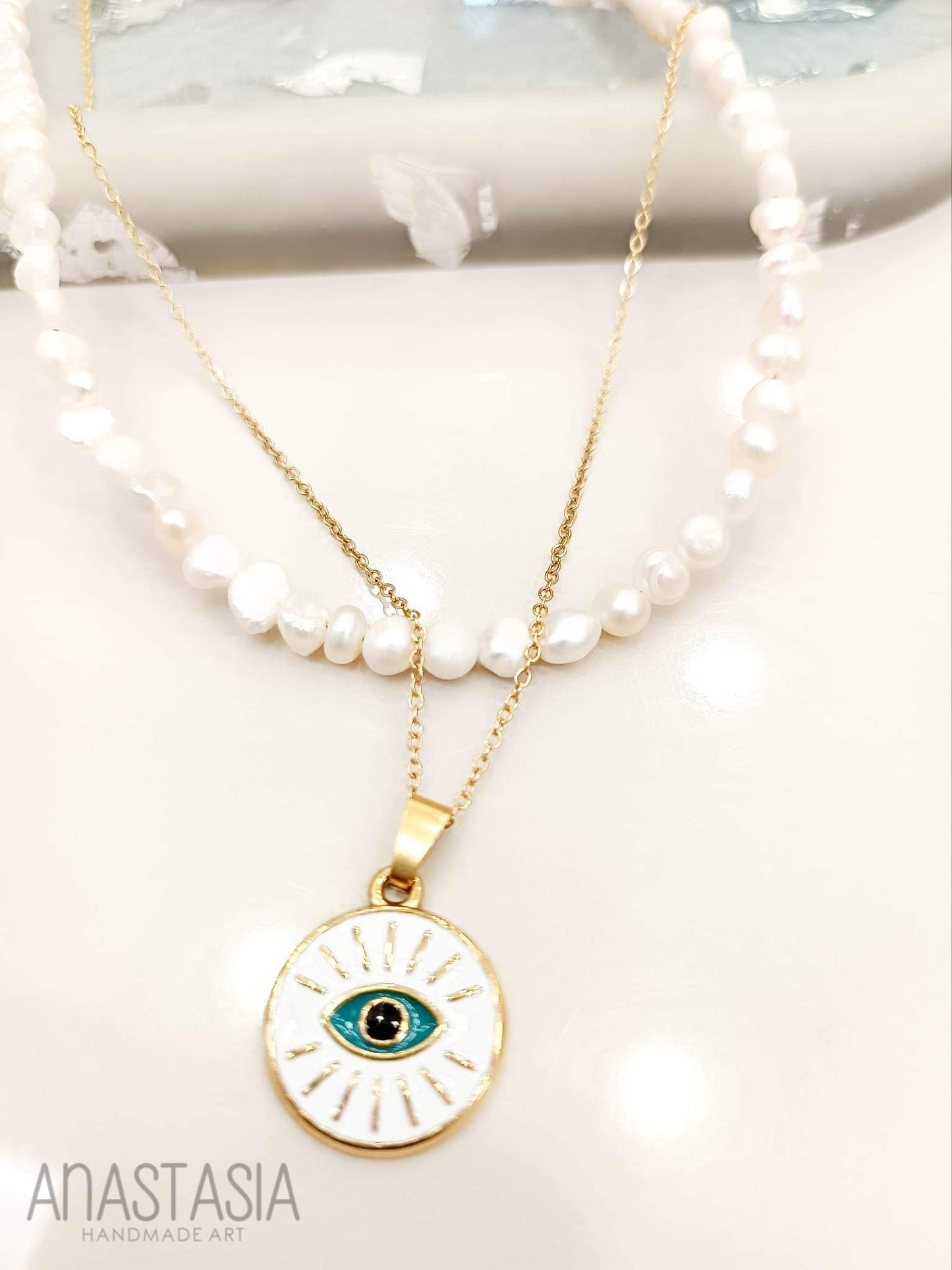 Necklace with evil eye charm