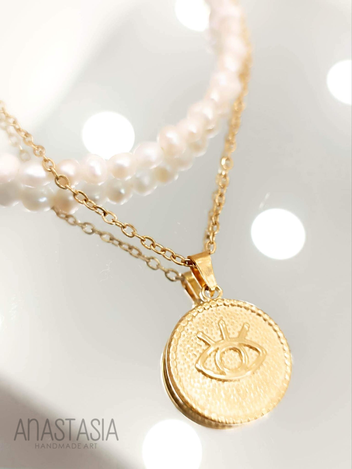 Necklace with evil eye charm