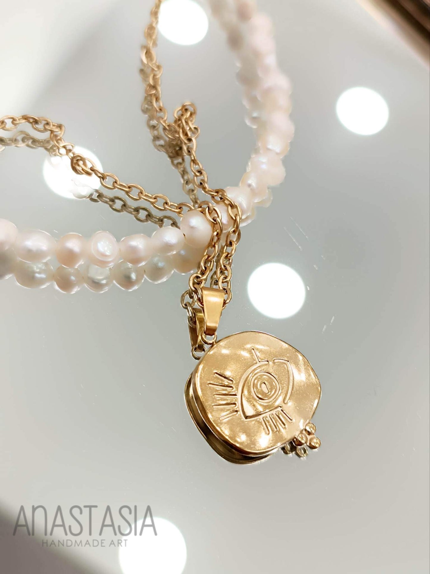 Necklace with evil eye charm