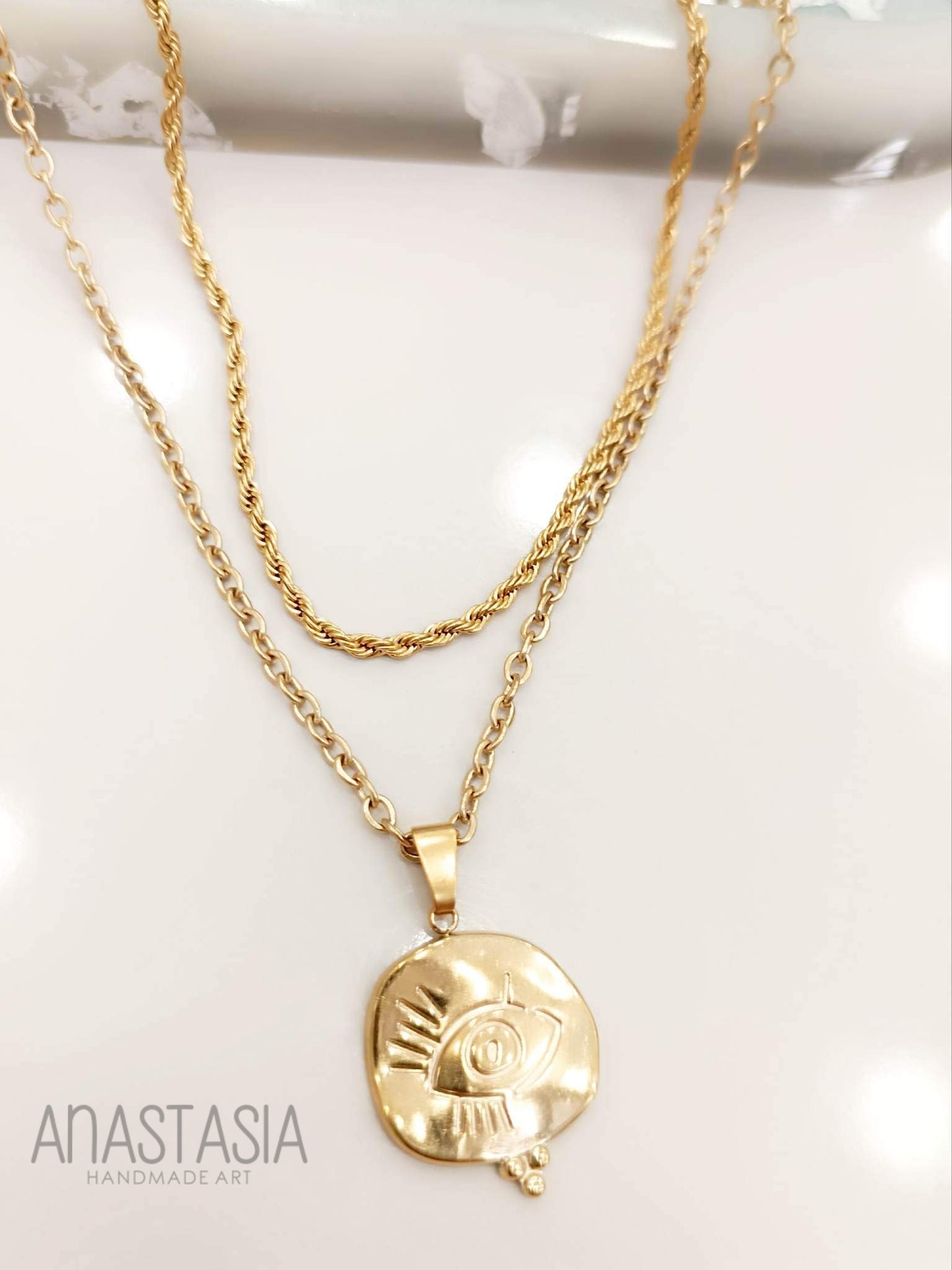 Necklace with evil eye charm