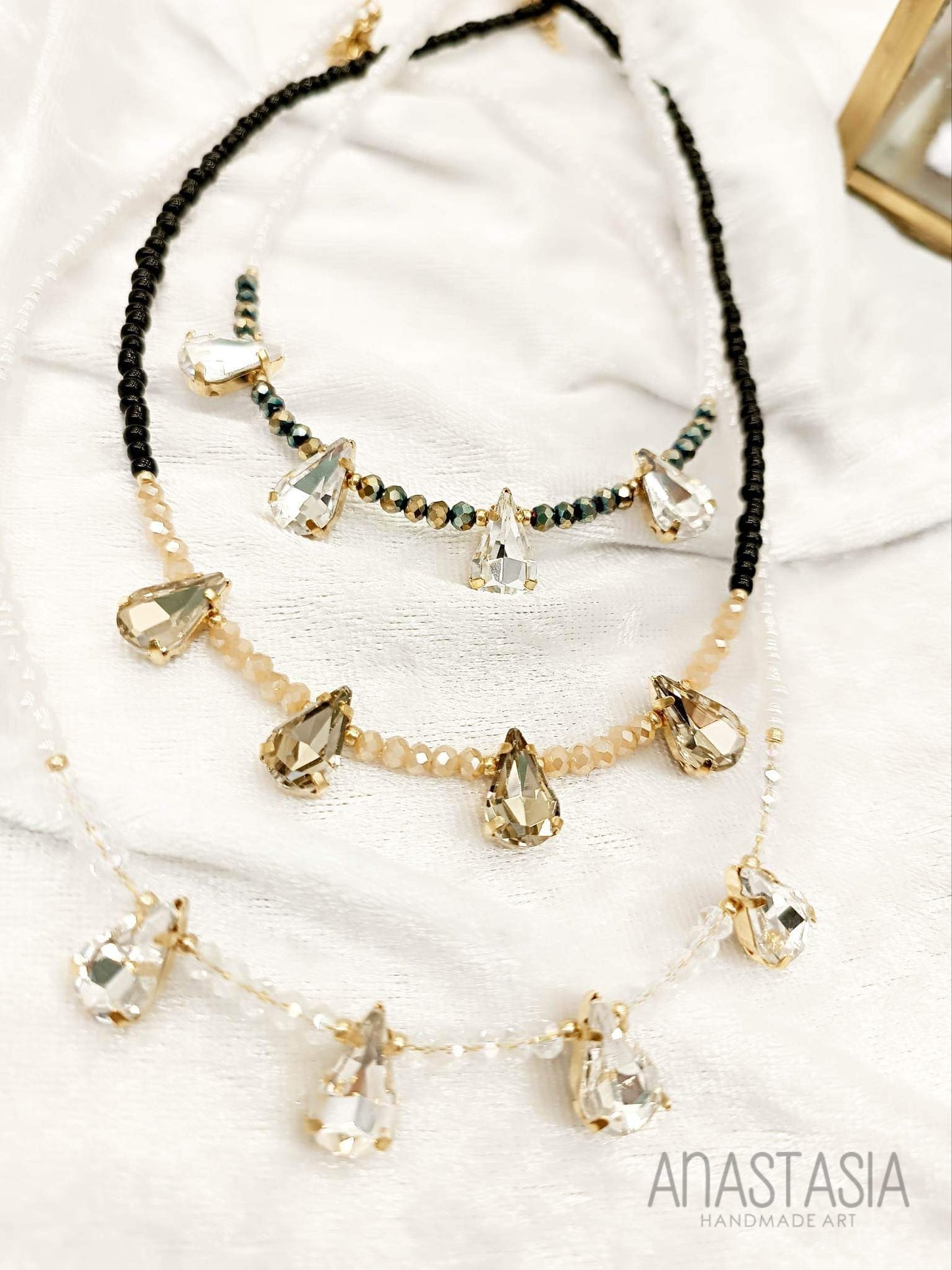 Necklace with beads and crystal stone charm