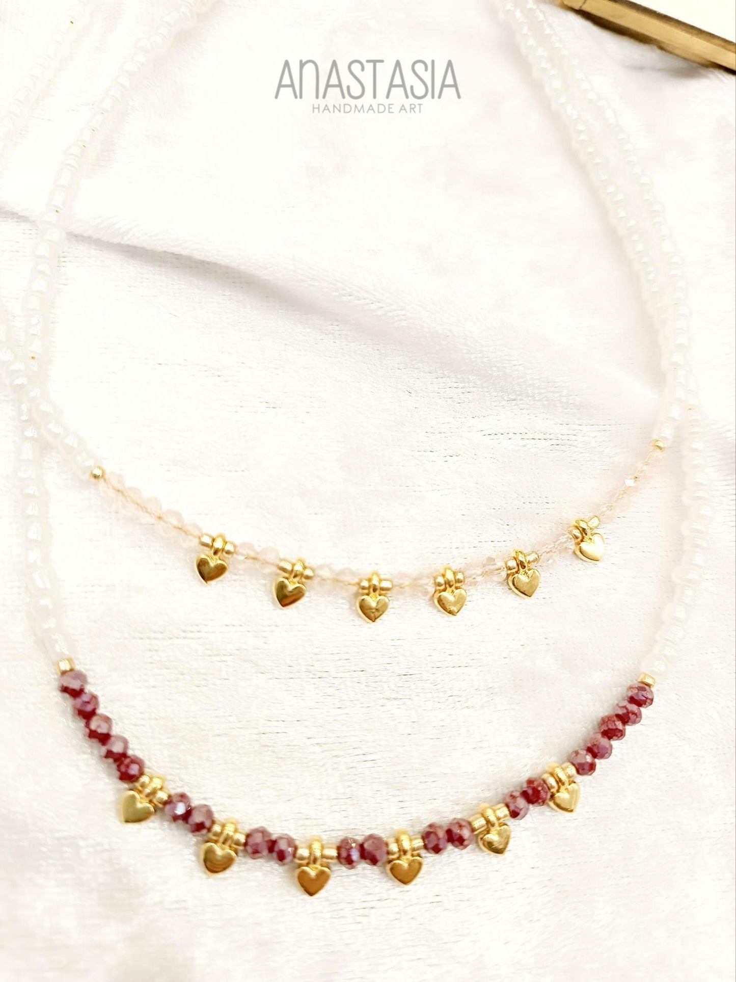 Necklace with beads and heart charms